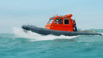 work-boat with enclosed cockpit