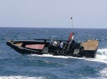 equipped rigid inflatable boat (outboard, four engines, center console, sundeck, roll-bar) SPORTECH 12 OPEN Duarry