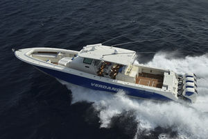 center console monohull boat / four-engine / sport-fishing / with cabin