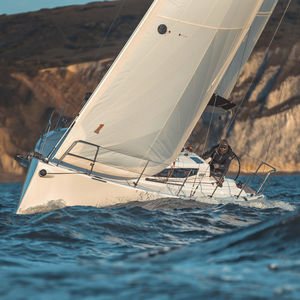 monohull / cruising-racing / open transom / with 2 or 3 cabins