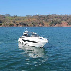 inboard express cruiser / soft-top / sport / 2-cabin