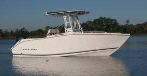 center console monohull boat / sport-fishing / with T-top