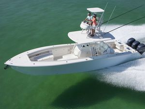 center console monohull boat / triple-engine / flybridge / sport-fishing