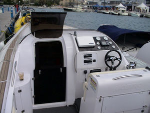 outboard inflatable boat / twin-engine / rigid / center console