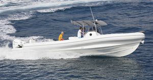 outboard inflatable boat / twin-engine / rigid / side console