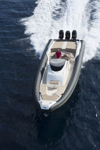triple-engine inflatable boat / center console / semi-rigid / 20-person max.