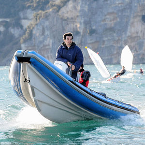 outboard inflatable boat / rigid / center console / with jockey console