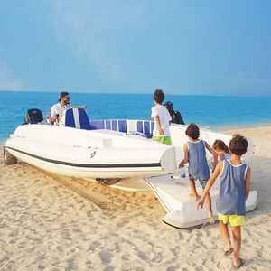 outboard inflatable boat / twin-engine / RIB / side console