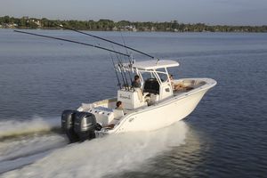 center console monohull boat / outboard / sport-fishing / with T-top