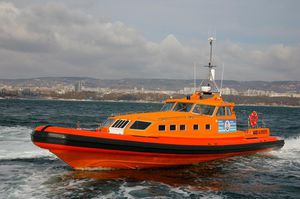 inboard rescue boat / inflatable boat / rigid inflatable / with enclosed cockpit