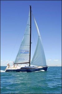 cruising sailing yacht / aluminum / deck saloon / twin steering wheels