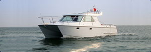 catamaran express cruiser / inboard / sport-fishing / aluminum