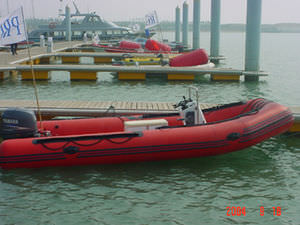 outboard inflatable boat / rigid / center console / 4-person max.