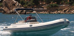 Equipped rigid inflatable boat (outboard, center console, sundeck) 560 18' 4