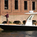 center console bay boat / sport-fishing / with T-top - 251 XS