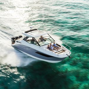lancha Express Cruiser com motor de popa / trimotor / soft-top / esportiva