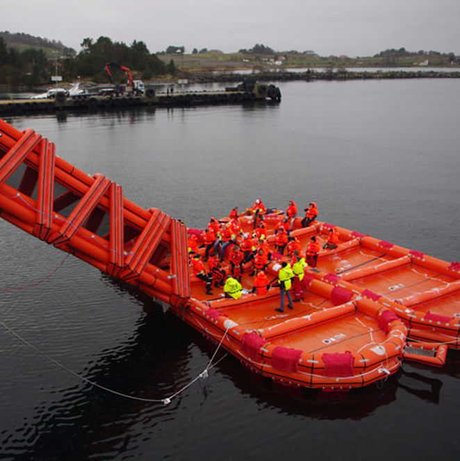 Survitec Group Ltd Marine evacuation system using single track slide and open reversible liferafts (ESS ORL 302)