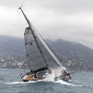 mainsail / for cruising sailing yachts / tri-radial cut / carbon