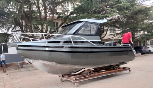Outboard day fishing boat - LEADER 588 - Qingdao Allheart Marine Co., Ltd. - wheelhouse / 6-person max. / teak deck