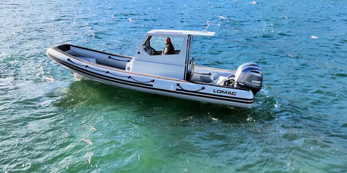Outboard inflatable boat - CLUB 760  - Lomac - twin-engine / rigid / with enclosed cockpit