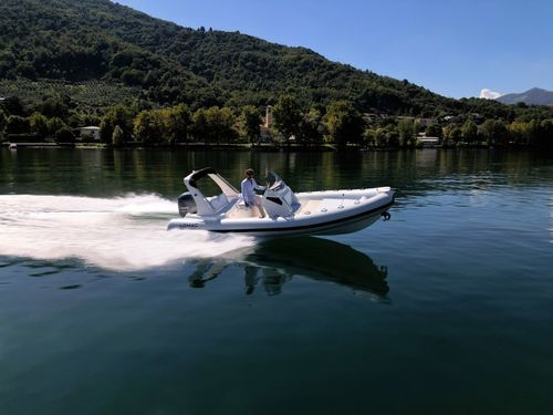 Outboard inflatable boat - EUFORIA 660 - Lomac - rigid / open / center console