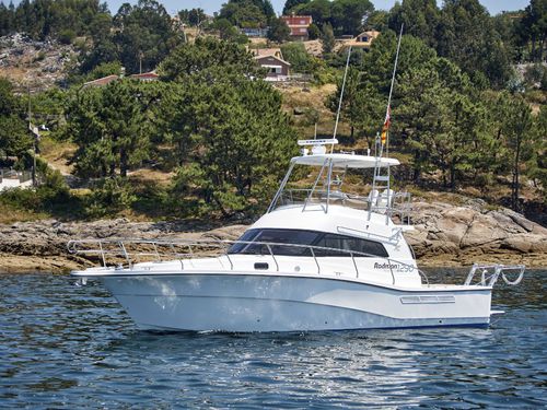 Inboard express cruiser - 1290 Fisher Pro - Rodman - twin-engine / flybridge / sport-fishing