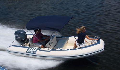 Outboard inflatable boat - Deluxe Series 430 - Novurania - rigid / open / side console