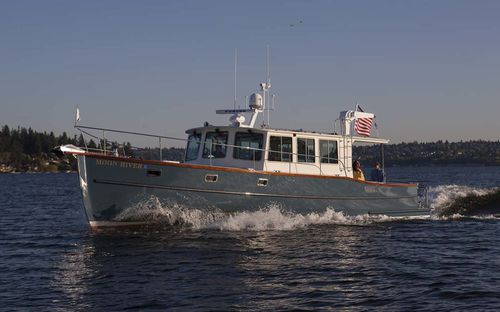 Inboard trawler - Moon River 48 - Devlin - diesel / semi-displacement hull / wheelhouse