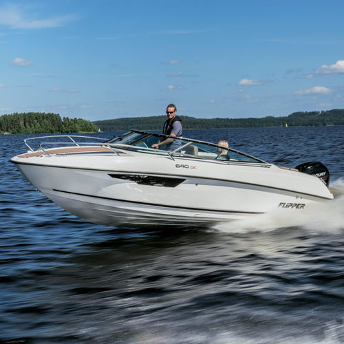 Outboard cabin cruiser - 650 DC - Flipper - open / dual-console / 7 ...