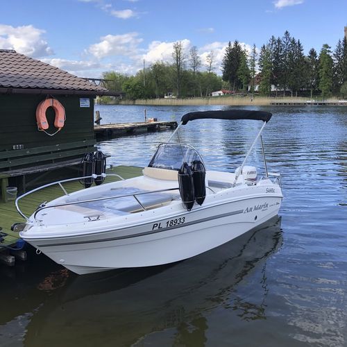Outboard center console boat - QX460 - Marine Times Newspaper - sport / recreational / 6-person max.