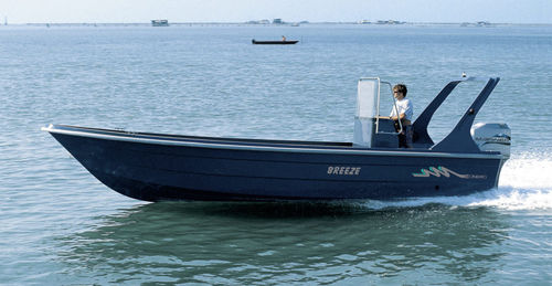 Outboard center console boat - BREEZE - SOCIETA' CONERO sas - twin-engine / fiberglass / 8-person max.