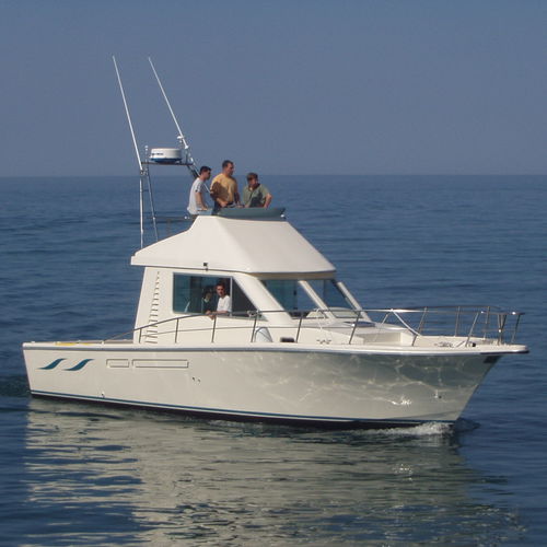 Inboard express cruiser - MARTINEZ CONSTRUCTIONS NAVALES - diesel / twin-engine / flybridge