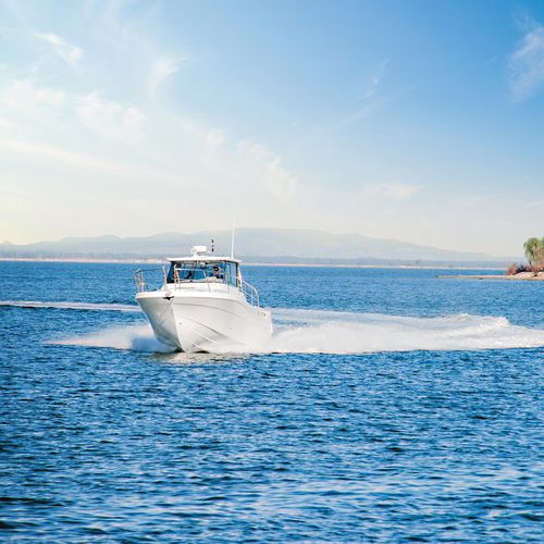 Outboard day fishing boat - BONITO 32 OB - MERCAN YACHTING - twin-engine / hard-top / fiberglass