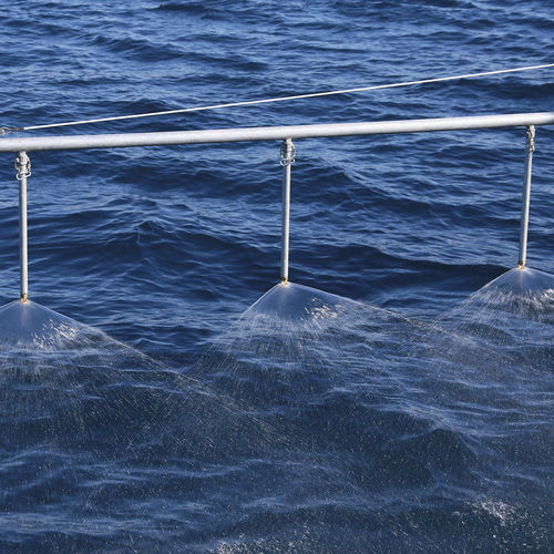 Dispersant spray system - ScorSpray - New Naval Ltd. - with arm / boat-mounted