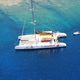 catamaran sailing yacht / with open transom / with deck saloon / fiberglass