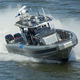 patrol boat / outboard / aluminum / rigid hull inflatable boat