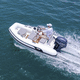 outboard inflatable boat / rigid / open / side console