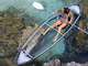 transparent kayak / sit-on-top / sea / adult