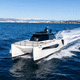 catamaran express cruiser / outboard / twin-engine / hard-top