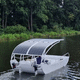 solar powered center console boat / outboard / twin-engine / hard-top