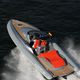 inboard inflatable boat / rigid / center console / with cabin