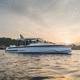 outboard express cruiser / twin-engine / soft-top / with cabin