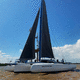 trimaran / ocean cruising / with bowsprit / folding arms