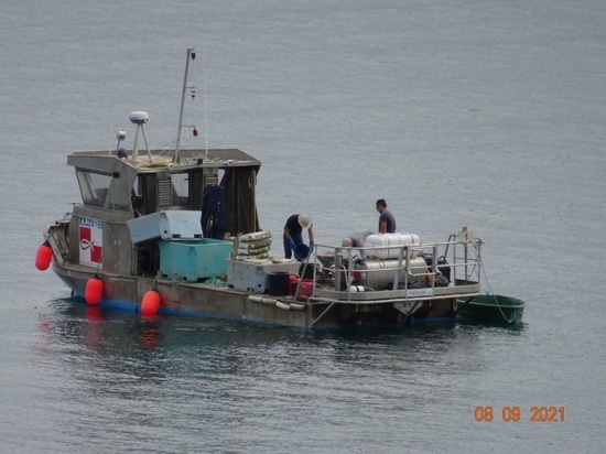 Photo of the barge used to install our low-impact mooring lines
