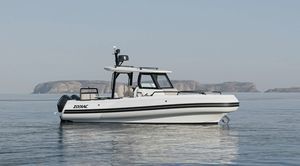 barco inflável com motor de popa 1