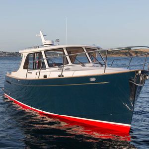 lancha Express Cruiser com motor de centro / bimotor / com casco semiplanante / com hard-top