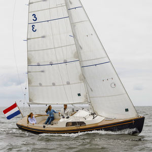 monocasco / de cruzeiro / tradicional / daysailer