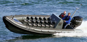 barco inflável com motor de popa 1