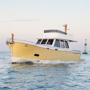 lancha Express Cruiser com motor de centro / a diesel / com flybridge / tipo lobster