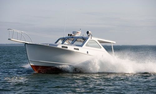 Lancha Express Cruiser com motor de centro - PATRIOT - Ellis Boat - a diesel / com casco de semideslocamento / de pesca esportiva